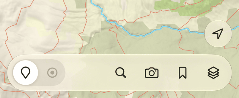 Explore tools: search, camera, Saved, and layers.